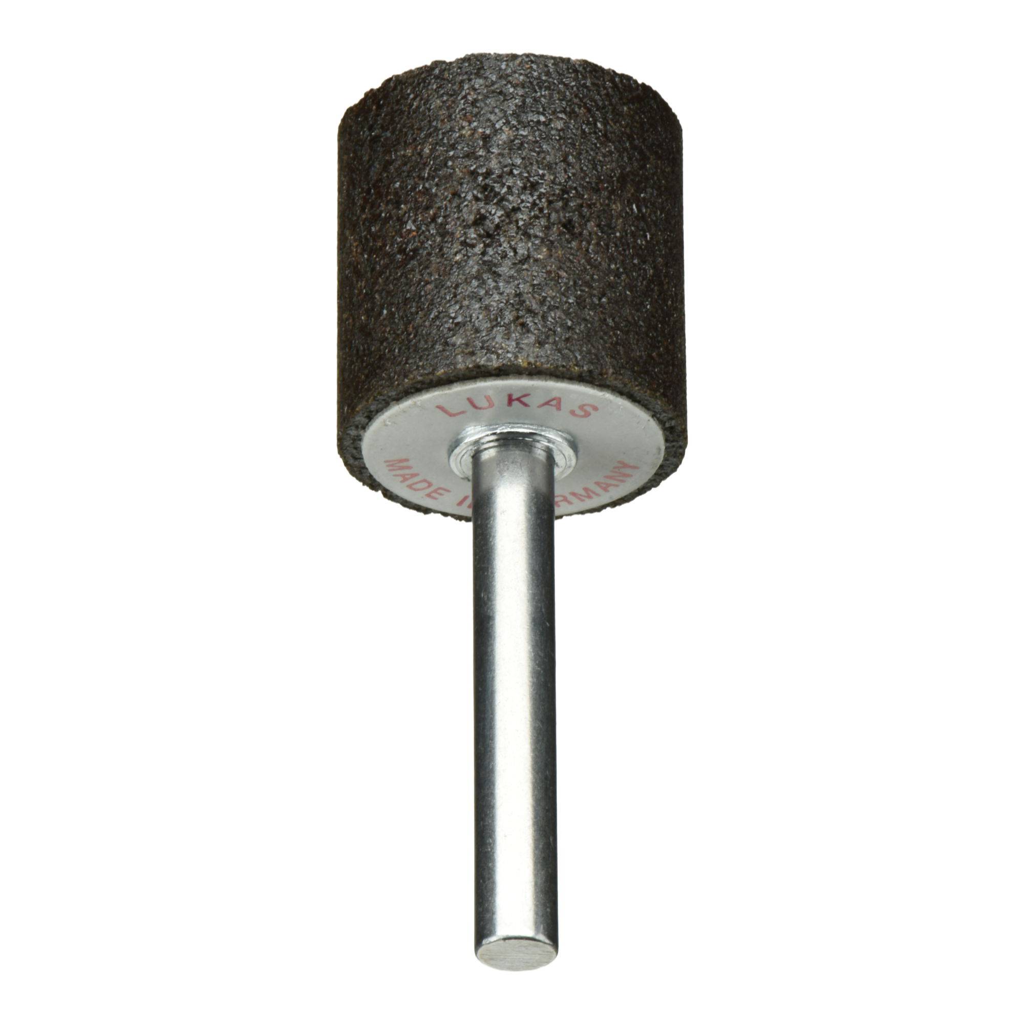 Ein zylindrisches Schleifwerkzeug mit einer strukturierten schwarzen Oberfläche und einem Metallschaft, das zum Schleifen oder Polieren verwendet wird. Die Basis trägt die Aufschrift 'Lukas'.