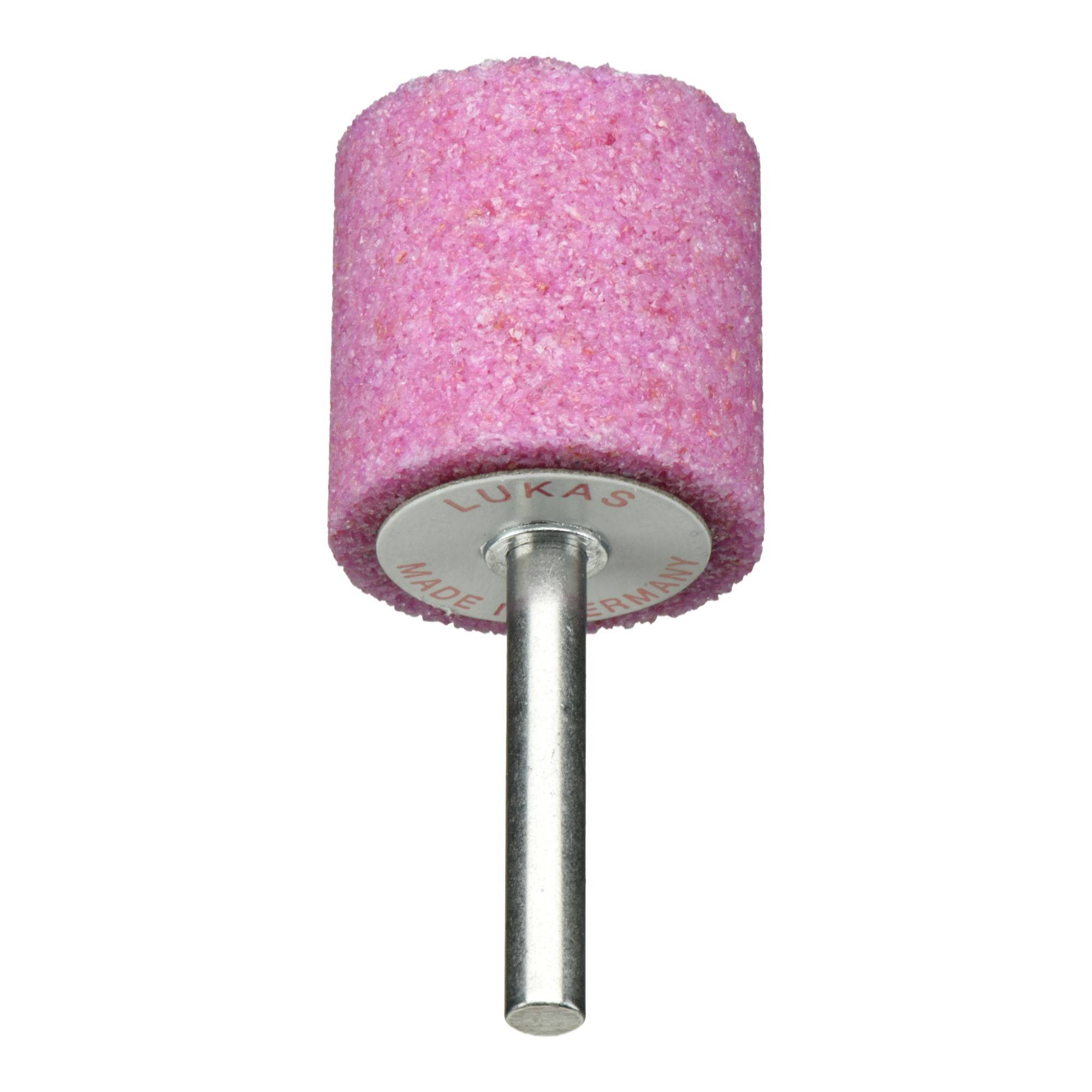 Ein zylindrischer rosa Schleifstein mit einem angebrachten Metallstab, der mit 