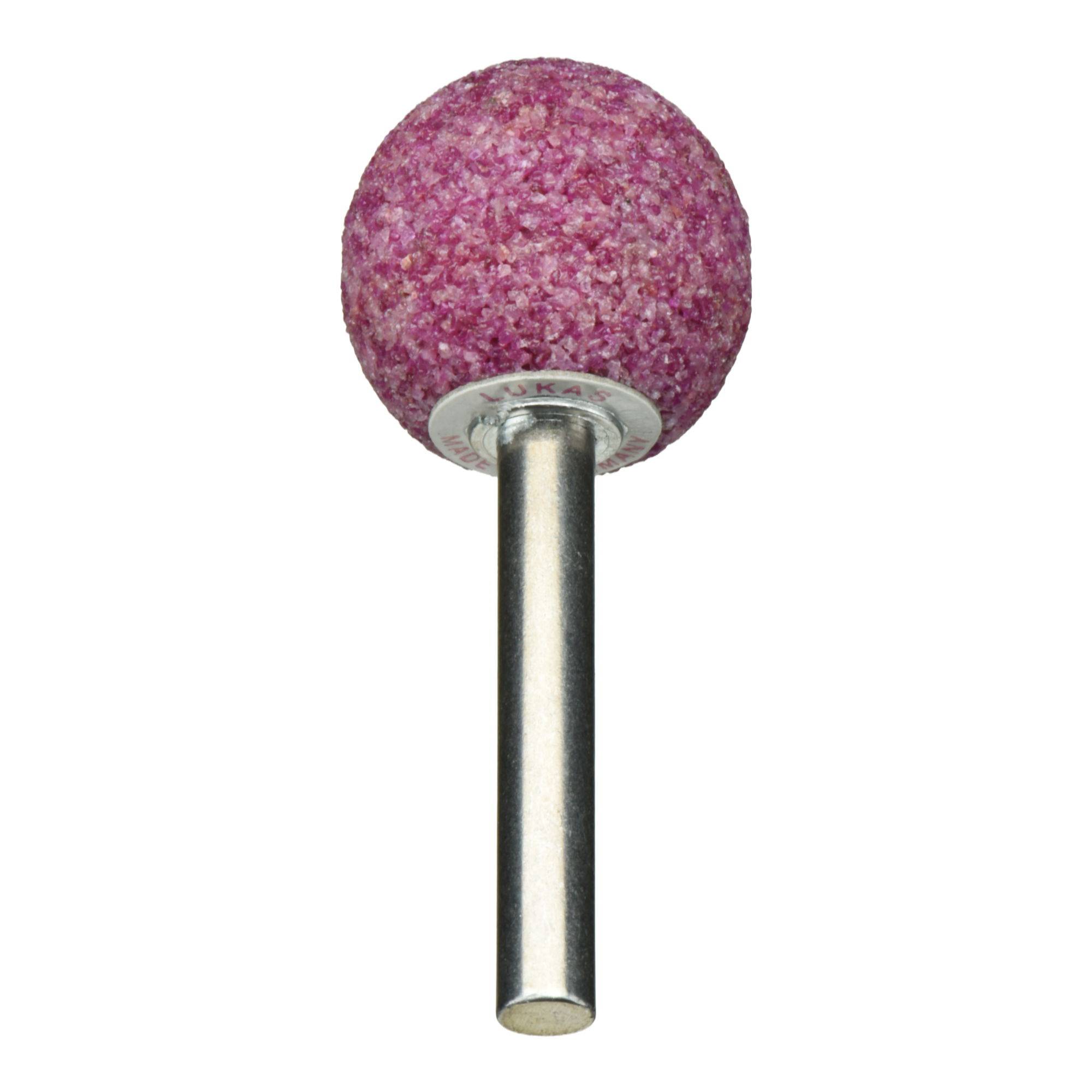 Ein rosa kugelförmiger Schleifstein mit einer kurzen Metallachse, der zum Schärfen oder Schleifen verschiedener Materialien verwendet wird.