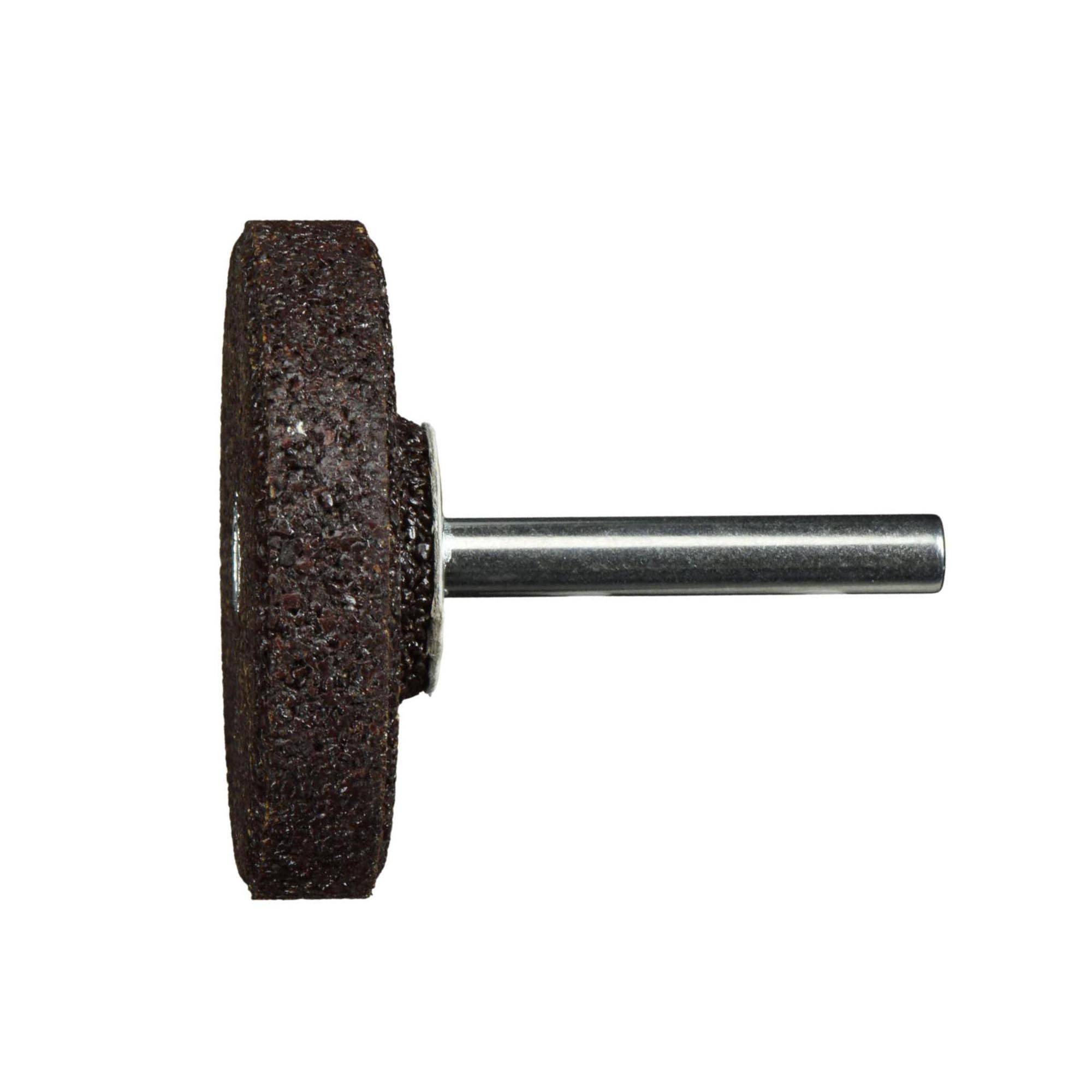 Ein Schleifrad mit Rotationsbewegung und Metallschaft, verwendet zum Polieren oder Formen von Materialien, aus Seitenansicht dargestellt.