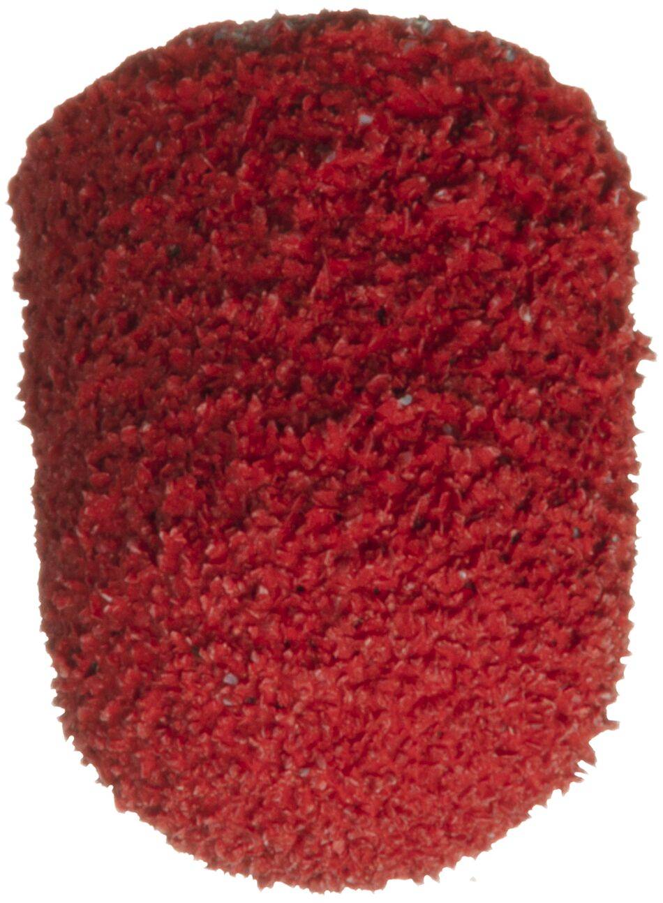 Eine Nahaufnahme einer roten texturierten Oberfläche, die einer groben Schwamm- oder Schleifmaterialstruktur ähnelt.