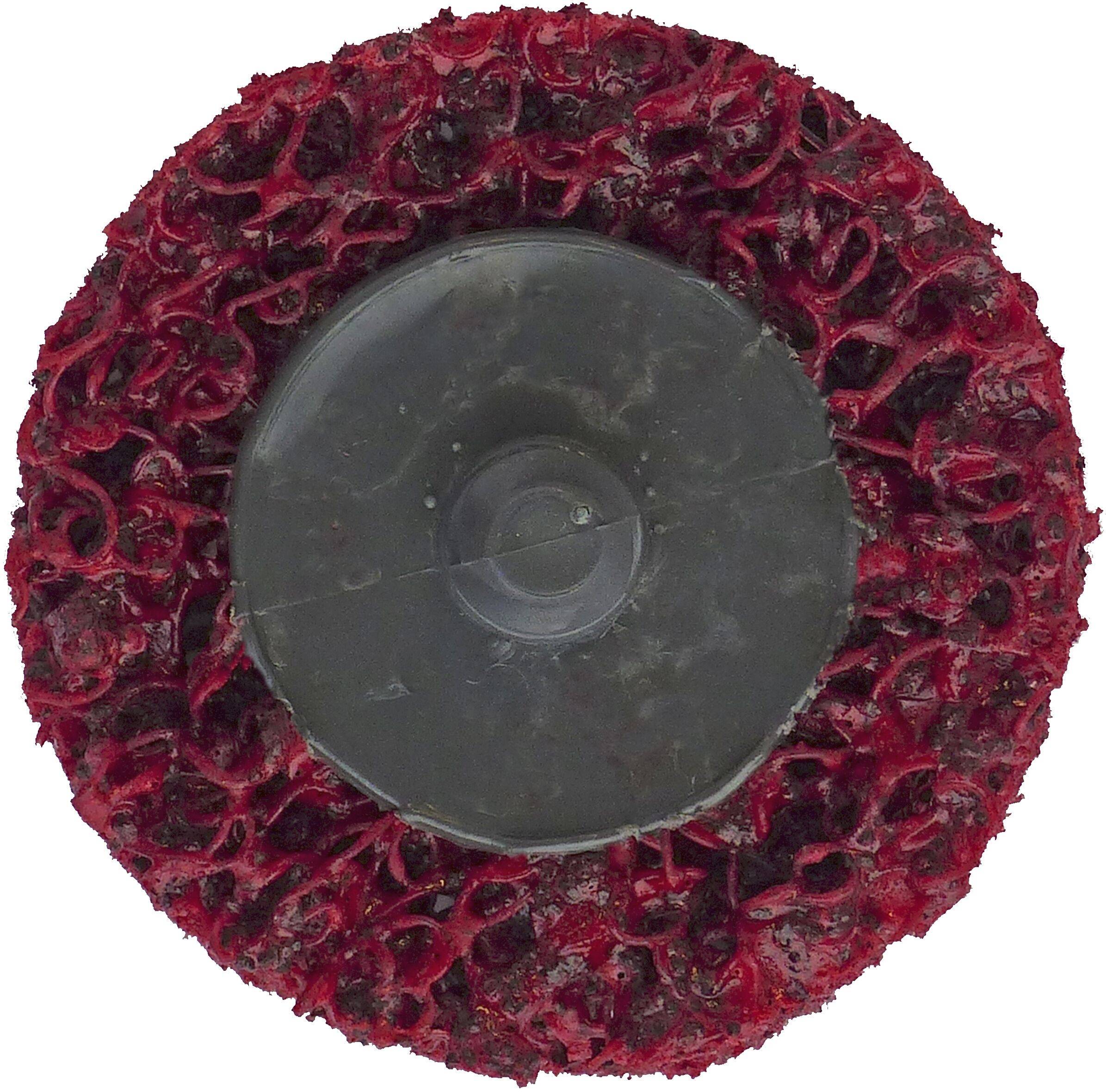 Ein rundes, raues rotes Reinigungspad mit einer zentralen schwarzen, glatten Fläche, das für Schrubbaufgaben auf verschiedenen Oberflächen verwendet wird.