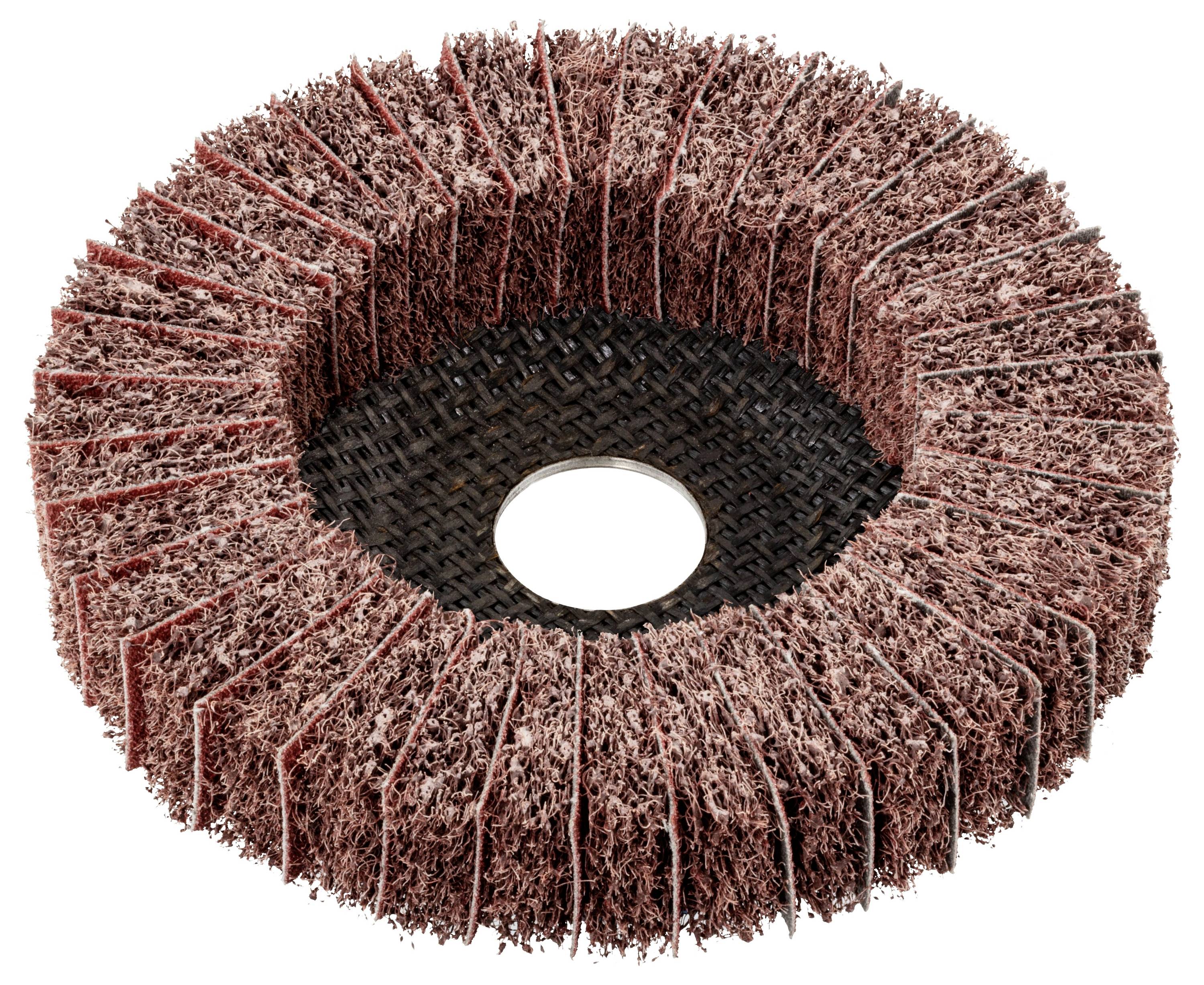 Eine kreisförmige Schleifscheibe mit einer strukturierten, rauen rosa Oberfläche und einem schwarzen Netzzentrum, die zum Polieren oder Schleifen von Materialien verwendet wird.