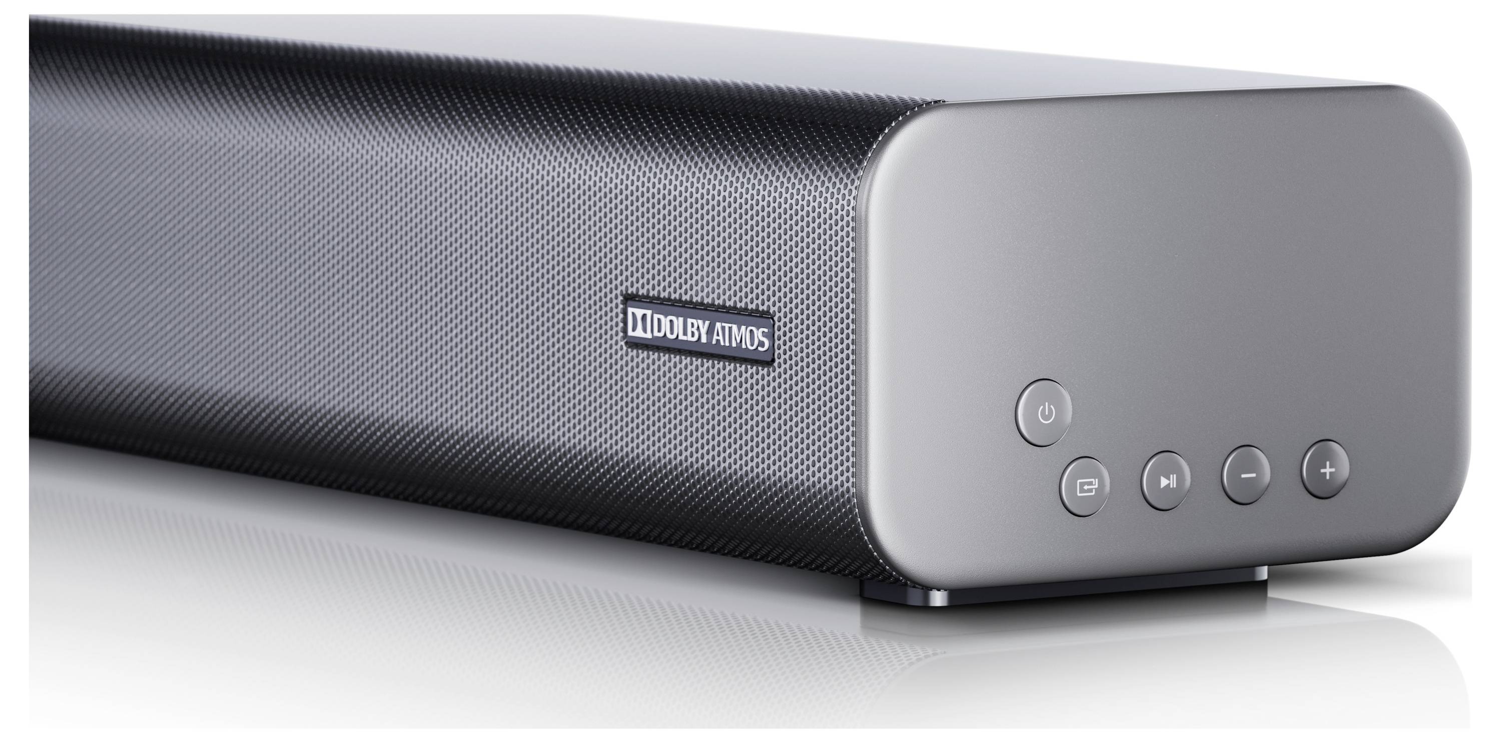 Eine elegante graue Soundbar mit einer 'Dolby Atmos' Beschriftung an der Vorderseite, ausgestattet mit Bedienungstasten an der Seite, entwickelt für verbesserte Audioerlebnisse.