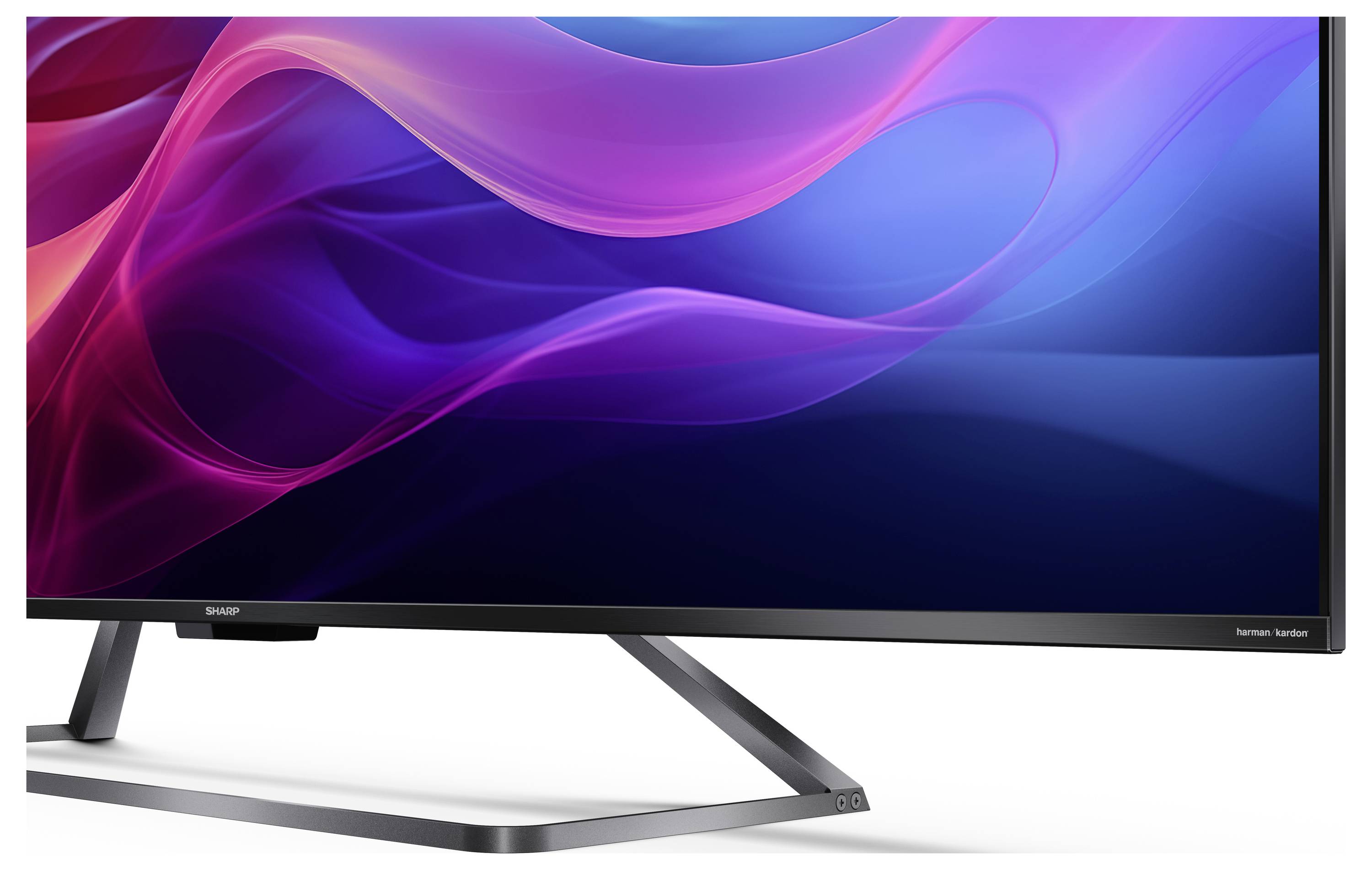 Ein Breitbildmonitor, der ein dynamisches, farbenfrohes Wellenmuster in Rosa- und Blautönen zeigt, auf einem metallfarbenen Ständer, vor einem weißen Hintergrund.