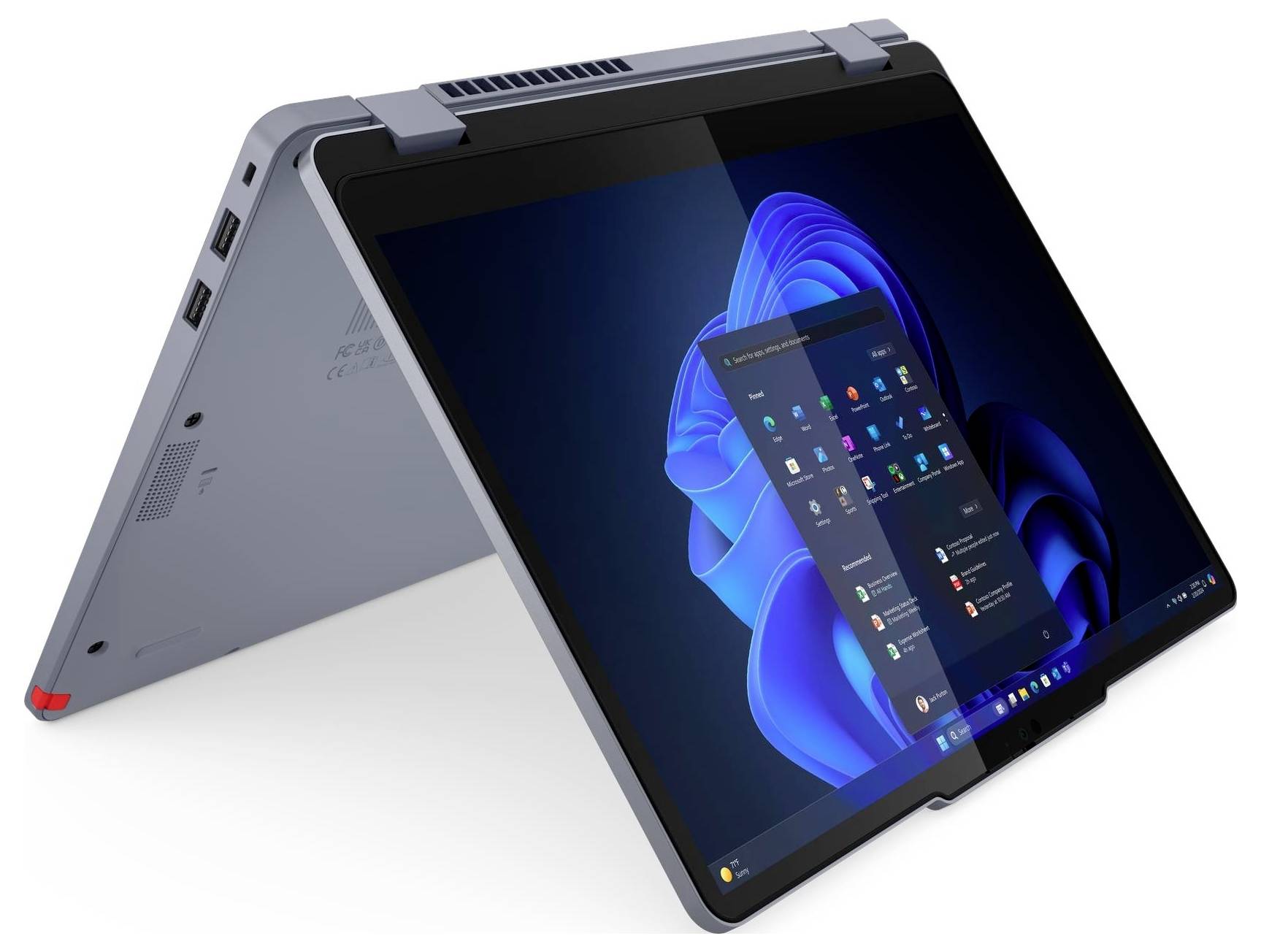 Ein Laptop im Zeltmodus zeigt eine Desktop-Oberfläche mit sichtbaren Anwendungssymbolen auf dem Bildschirm vor einem dunklen Hintergrund.