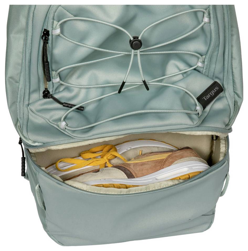 Ein offener türkisfarbener Rucksack mit einem Reißverschlussfach, in dem ein Paar Schuhe zu sehen ist, mit elastischen Trägern an der Außenseite zur Organisation.