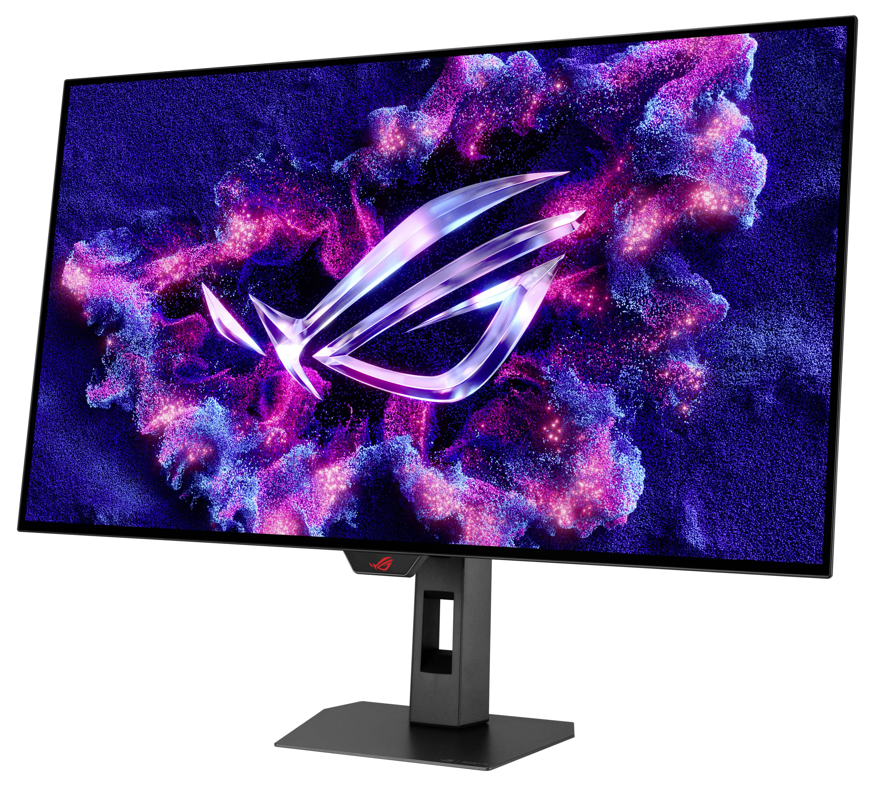 Ein Gaming-Monitor, der ein leuchtendes, futuristisches Logo mit rosa und lila kosmischen Wolkenmustern vor einem dunklen Hintergrund zeigt.