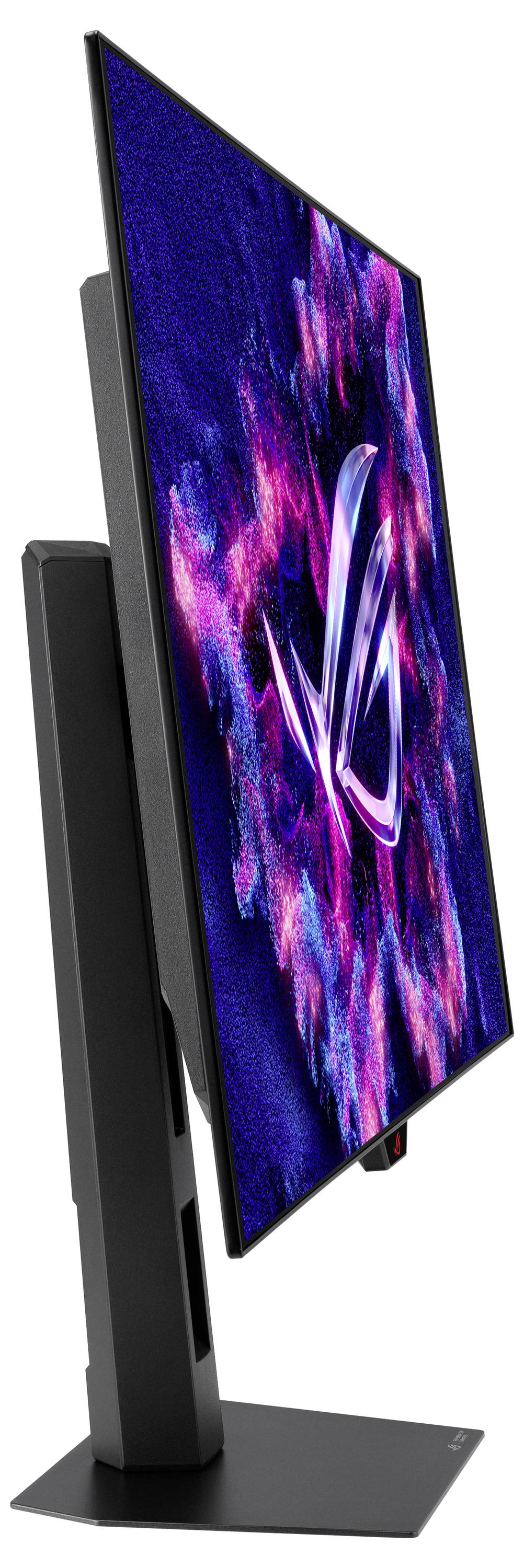 Ein schlanker, moderner Computermonitor mit einer lebendigen, abstrakten Darstellung von Rosa- und Blautönen, von der Seite auf einem stabilen Ständer betrachtet.