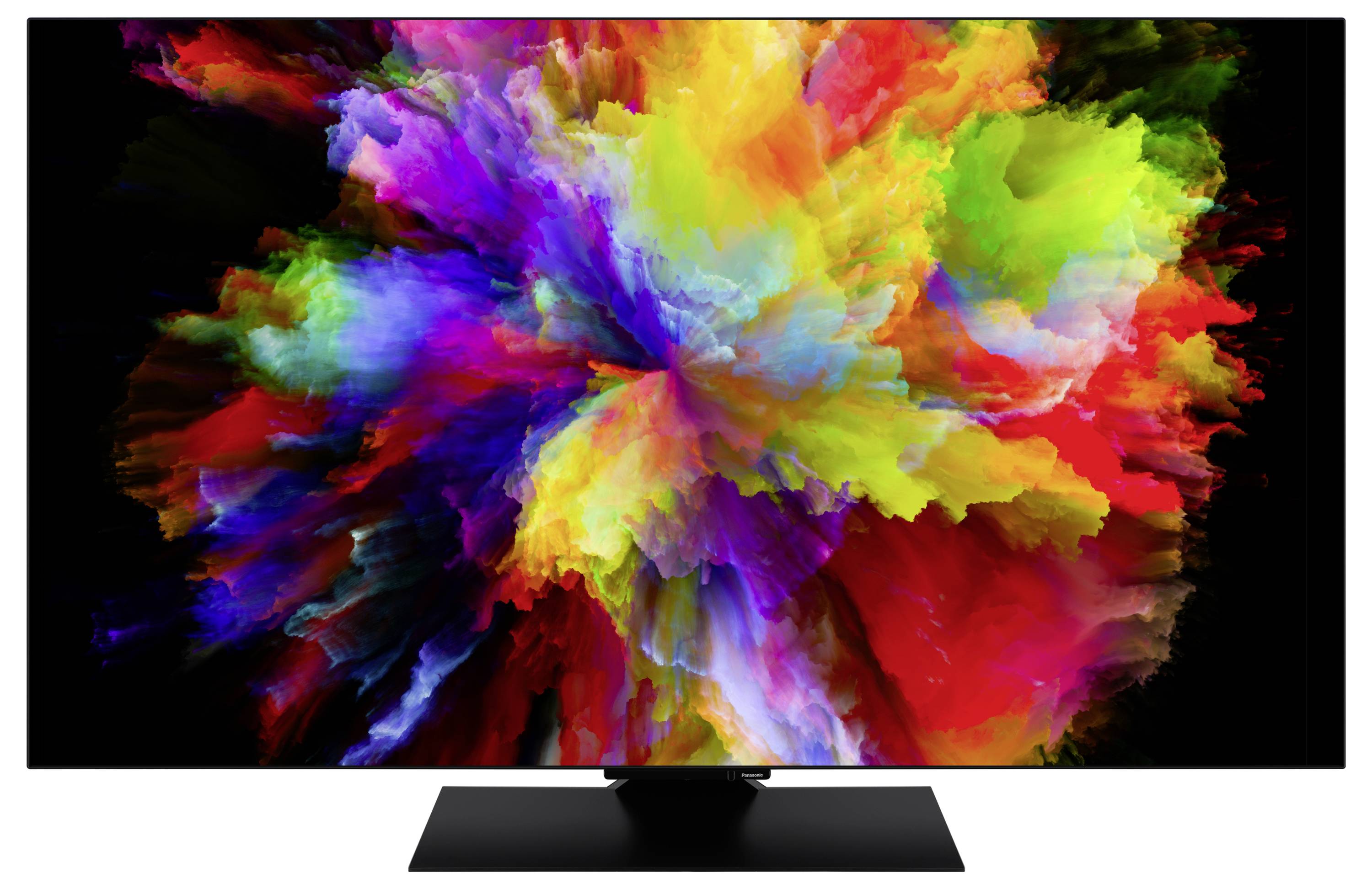 Ein Spritzer lebendiger Farben, darunter Rot, Gelb, Grün und Blau, die sich gegen einen schwarzen Hintergrund ausbreiten und einen abstrakten Kunsteffekt erzeugen.