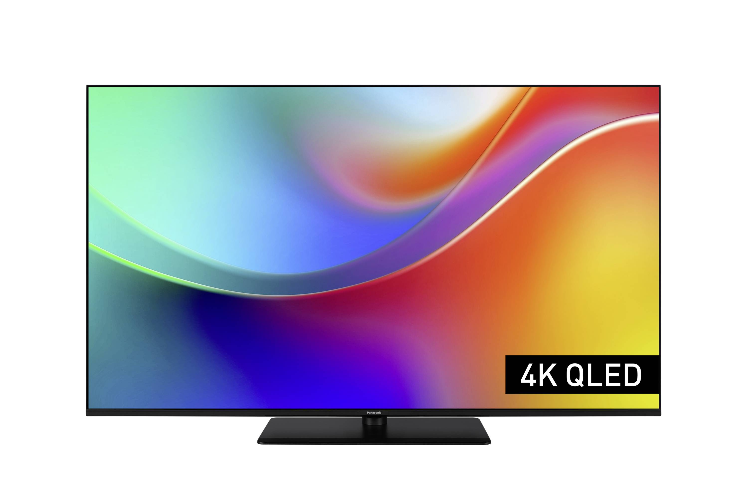 Ein Fernsehbildschirm, der einen bunten abstrakten Hintergrund zeigt, mit einer Beschriftung '4K QLED' in der unteren rechten Ecke.