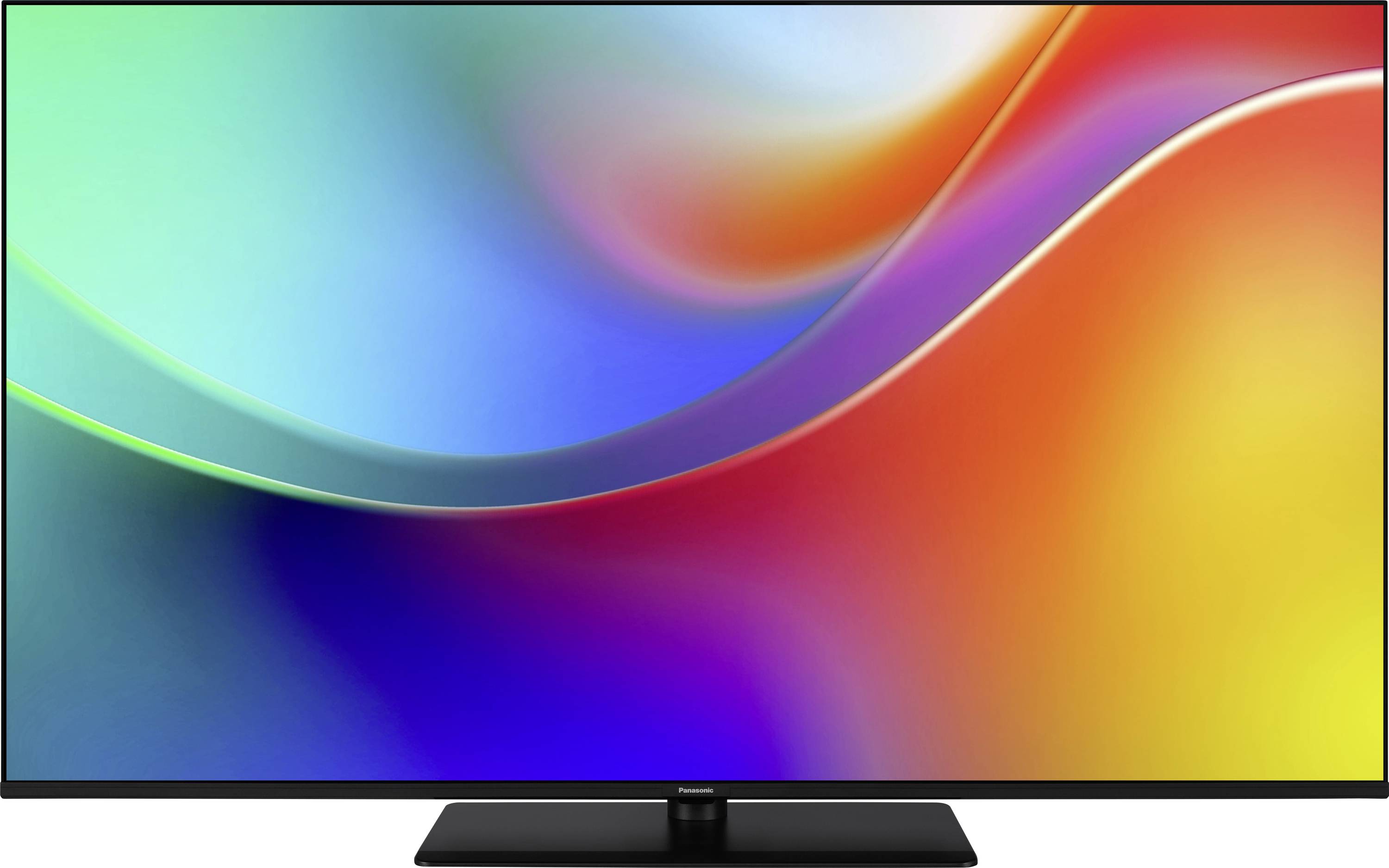 Ein Flachbildfernseher, der einen lebendigen Wirbel aus Farben zeigt, darunter Blau, Grün, Rot und Orange. Das Design ähnelt einem Farbverlauf.