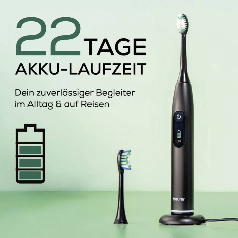 Elektrische Zahnbürste mit 22-Tage-Batterielaufzeit, gezeigt mit Ersatzkopf in einer minimalistischen Umgebung. Ladezeigerymbol angezeigt.