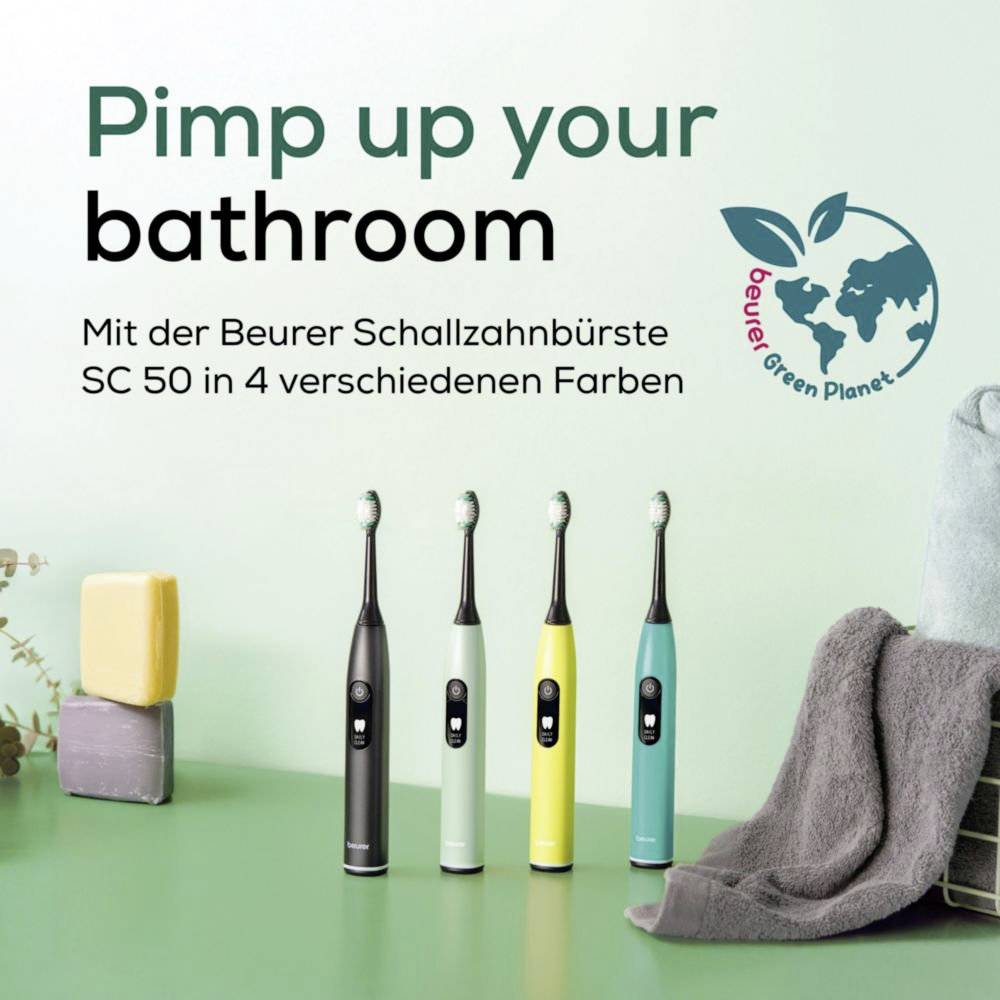 Vier Beurer SC 50 Elektrozahnbürsten in verschiedenen Farben stehen aufrecht. Text liest sich: 