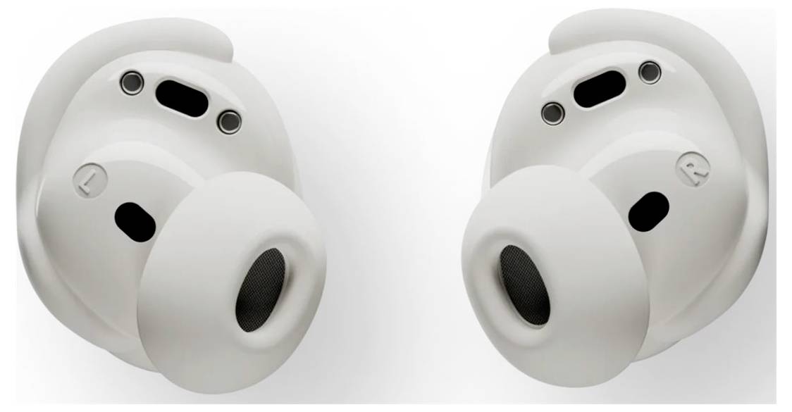 Weiße kabellose Ohrhörer mit Silikonohreinsätzen, von hinten gezeigt und mit Sensoren und Ladekontaktpunkten.