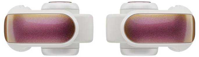 Zwei weiße VR-Controller mit metallic-rosa Griffen werden nebeneinander liegend, nach vorne gerichtet, gezeigt.