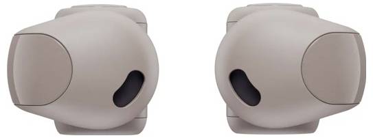 Draufsicht eines Paares beige-farbener kabelloser Kopfhörer mit einem eleganten, abgerundeten Design und sichtbaren Ladekontakten.