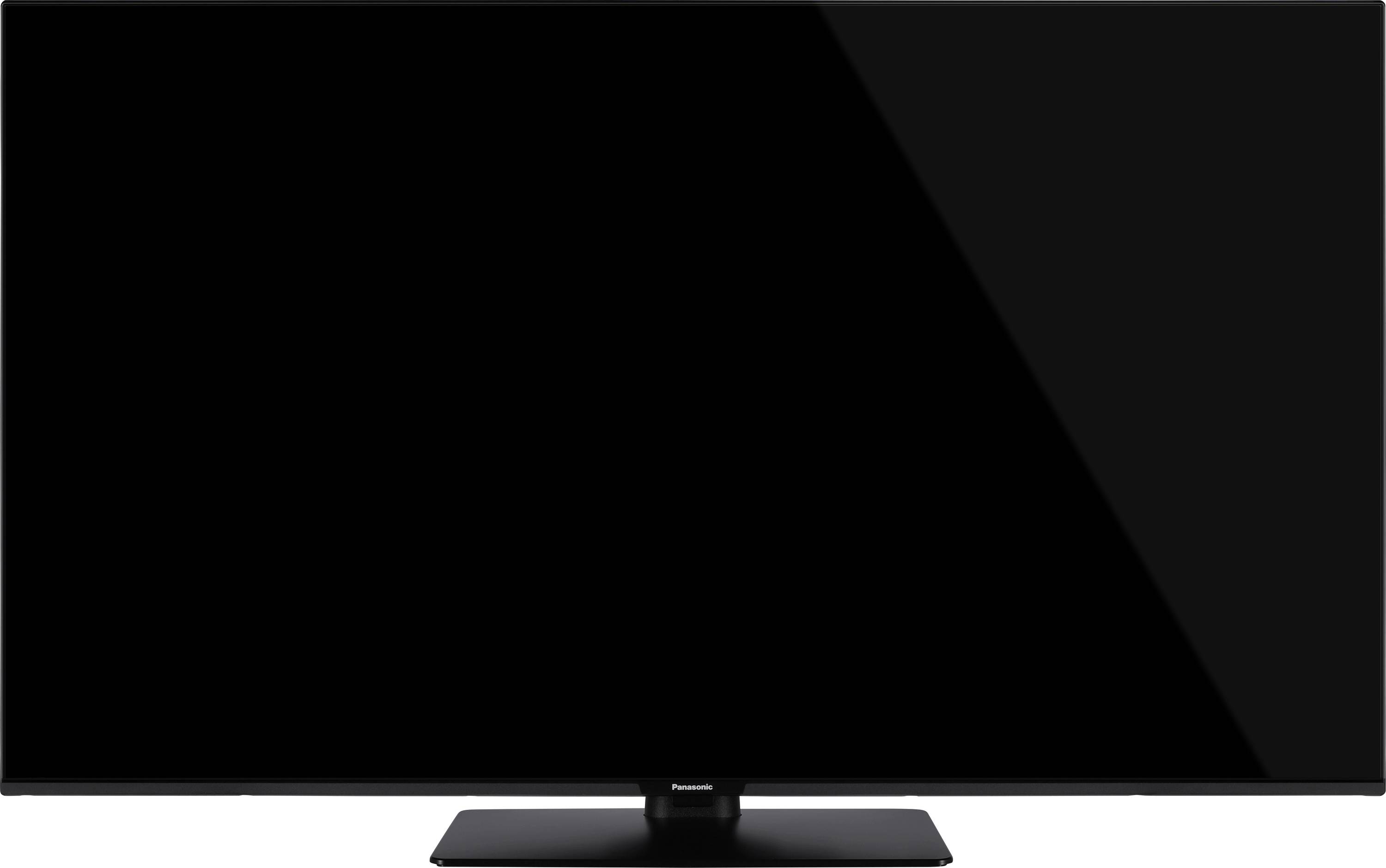 Ein Flachbildschirm-Fernseher mit schwarzem Rahmen und zentralem Ständer, der einen leeren Bildschirm zeigt.