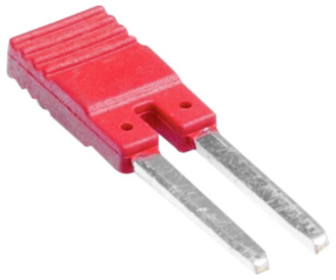 Eine rote Plastikbrücke mit zwei Metallstiften, die in der Elektronik verwendet wird, um Anschlüsse auf einer Leiterplatte zu verbinden.