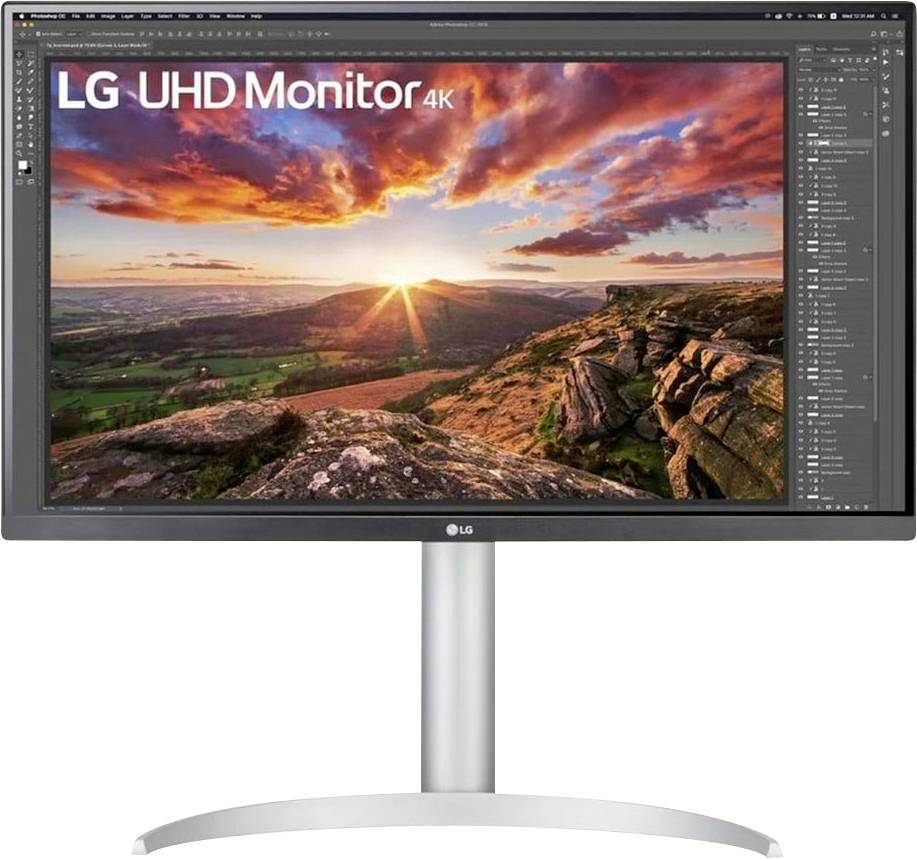 LG UHD-Monitor, der eine lebendige Sonnenunterganglandschaft mit felsigem Gelände und farbenfrohen Wolken zeigt. Verschiedene Bearbeitungswerkzeuge sind auf dem Bildschirm sichtbar.