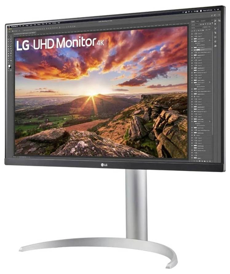 Ein Computermonitor zeigt eine lebhafte Landschaft mit leuchtenden Farben während des Sonnenuntergangs. Auf dem Bildschirm steht 'LG UHD Monitor 4K'.