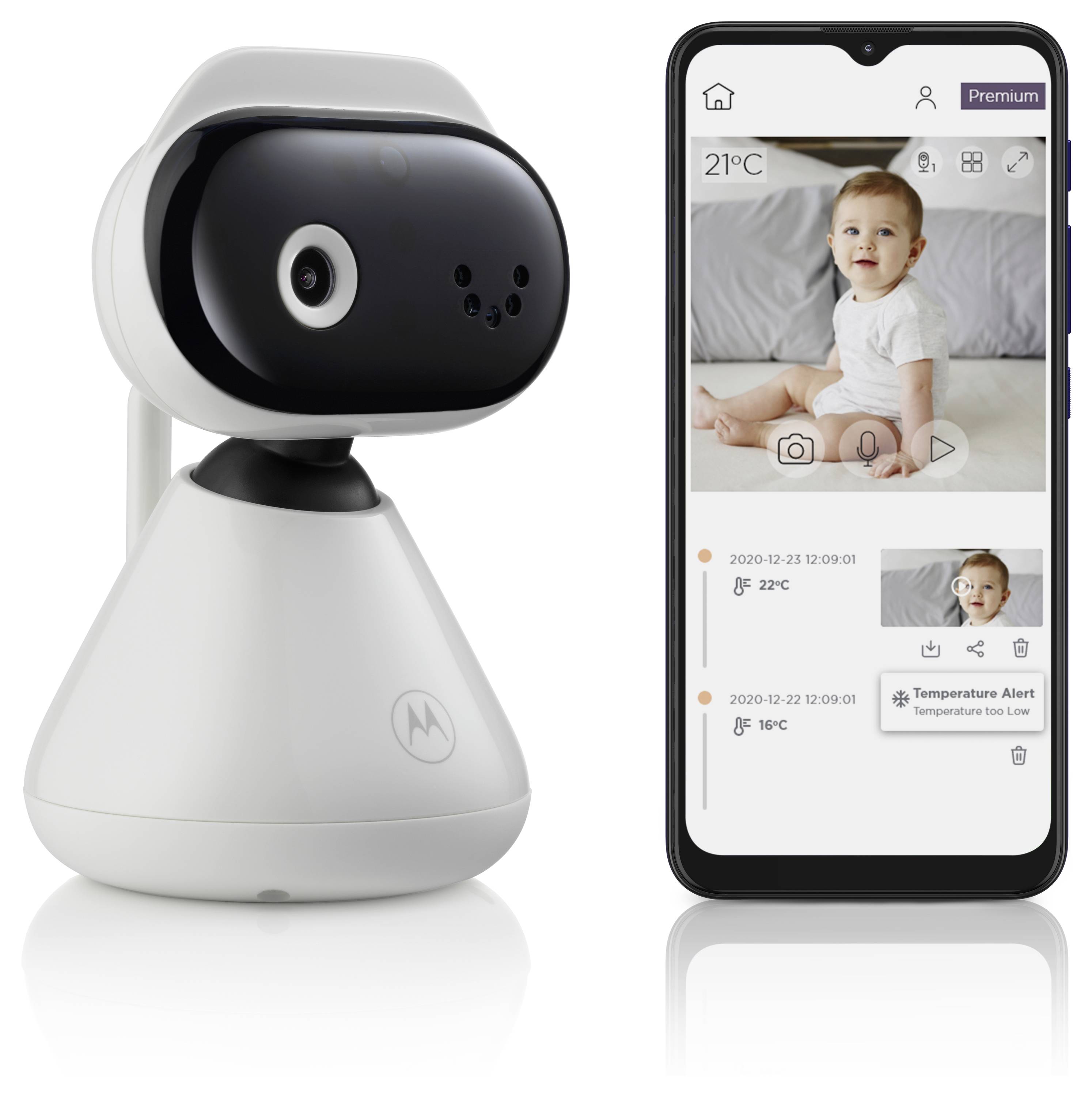Eine Babyphone-Kamera neben einem Smartphone, das einen Live-Videostream eines Babys anzeigt. Der Bildschirm des Telefons zeigt Temperaturwarnungen.