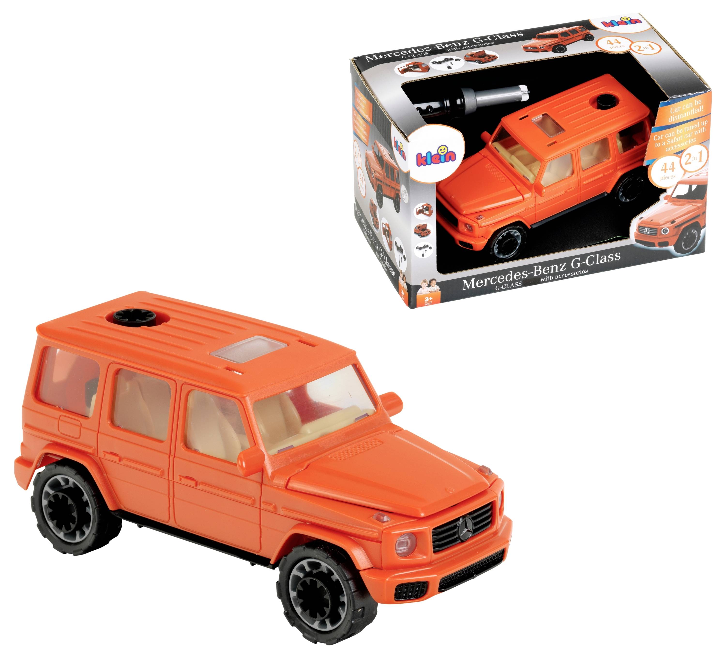 Orangefarbenes Mercedes-Benz G-Class Spielzeugmodell neben seiner Verpackung, wobei ein ähnliches Fahrzeug auf der Schachtel mit Markenbeschriftung und Anweisungen zu sehen ist.