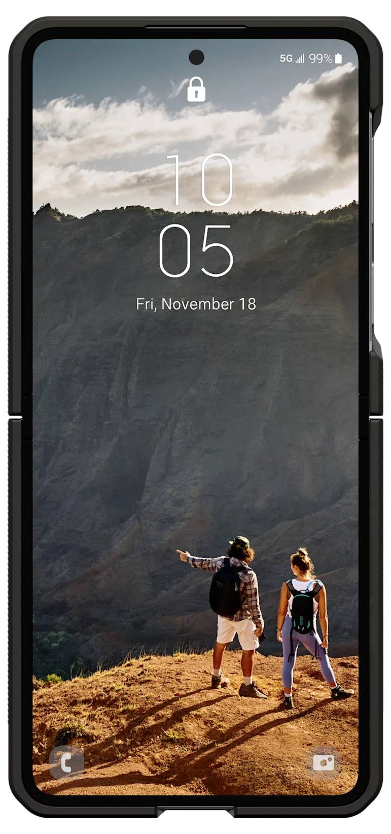 Ein Smartphone-Bildschirm, der einen Sperrbildschirm mit dem Datum 'Freitag, 18. November' zeigt. Zwei Personen stehen auf einem Bergrand unter einem bewölkten Himmel.
