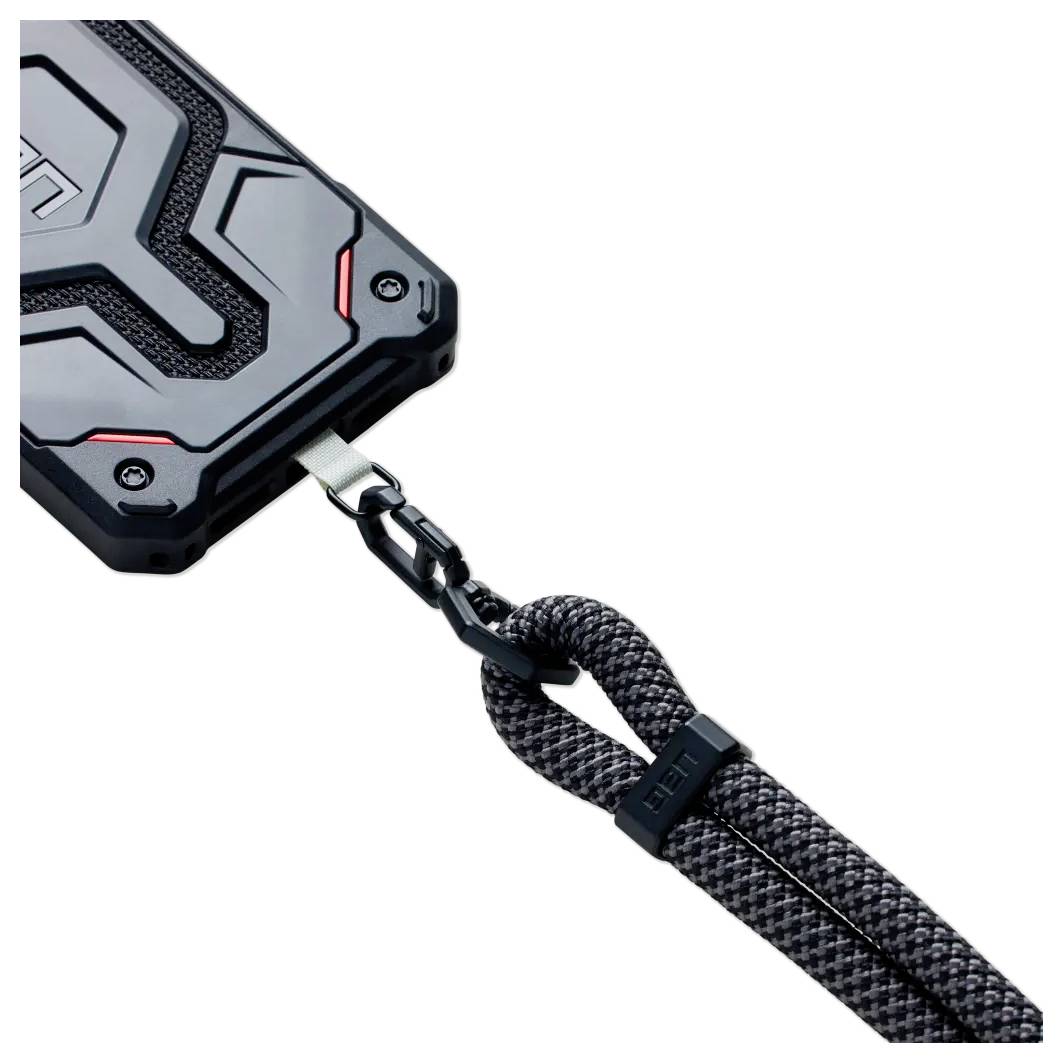 Eine robuste Handyhülle mit einem schwarz-roten Design, befestigt an einem strapazierfähigen geflochtenen schwarzen Schlüsselband mit einer Metallklemme.