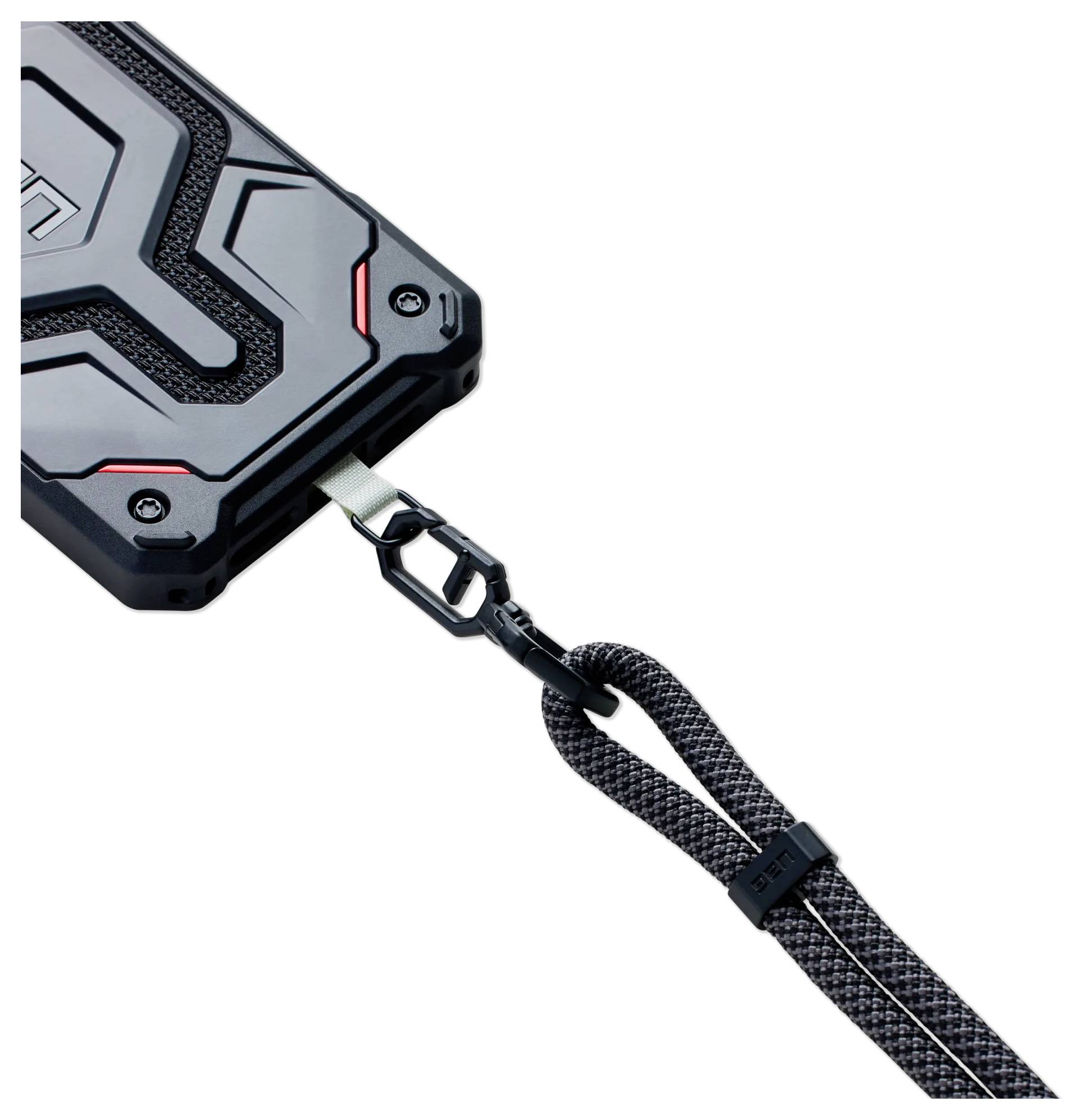 Ein robustes Handyhülle mit strukturierter Griffoberfläche ist an einem schwarz-grauen geflochtenen Trageband befestigt, das mit einem Metallclip zur einfachen Mitnahme gesichert ist.
