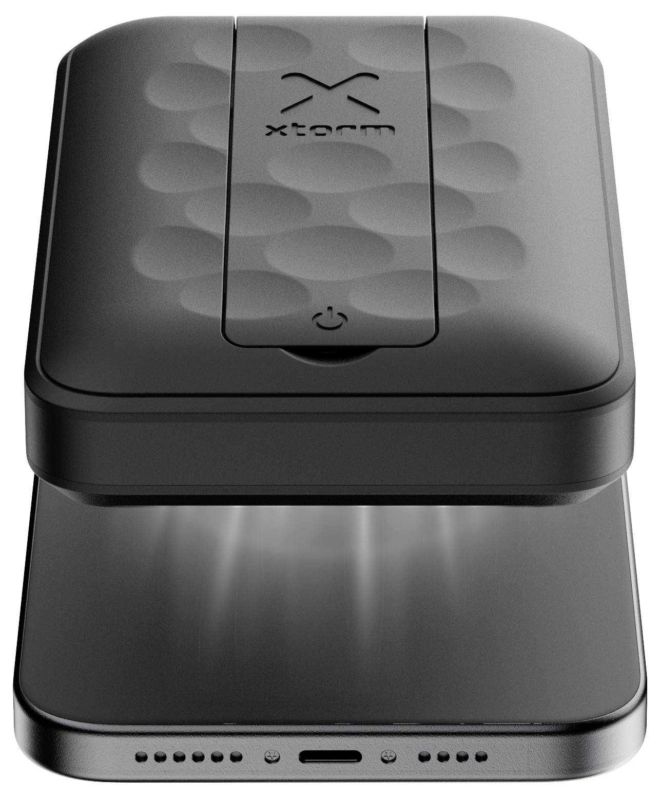 Ein UV-Sterilisationsgehäuse, das ein Smartphone mit Licht desinfiziert. Der obere Deckel des kompakten Geräts hat ein strukturiertes Muster und einen Einschaltknopf.