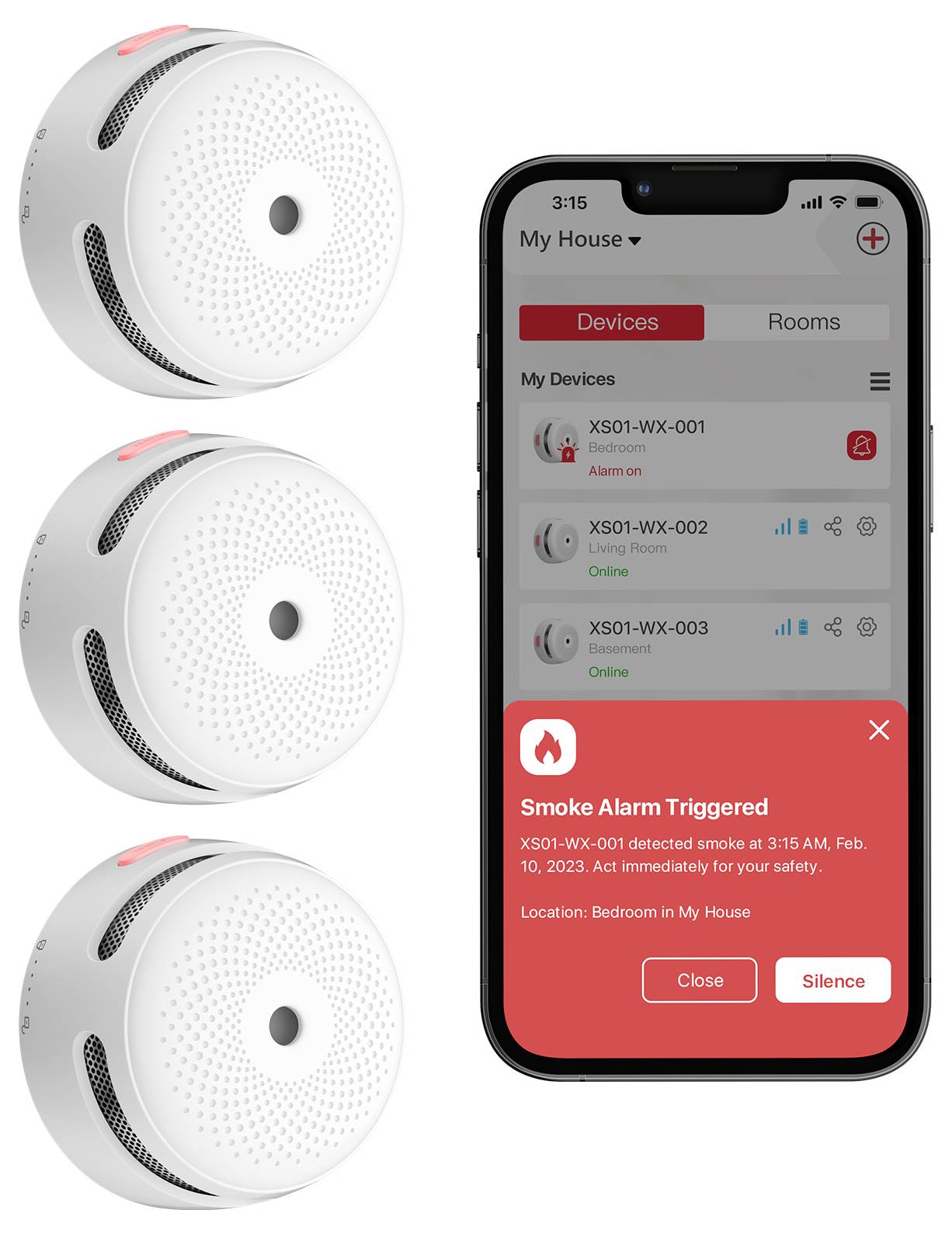 Stapel von drei Rauchmeldern neben einem Smartphone, das eine Benachrichtigung mit der Aufschrift 