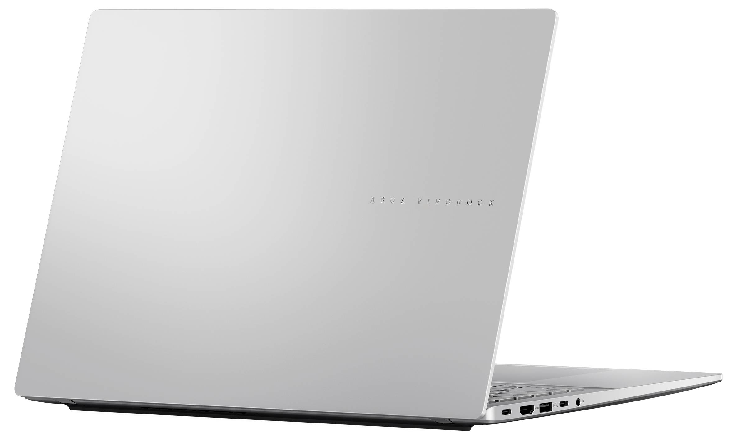 Ein schlankes, geschlossenes silbernes Laptop, von hinten betrachtet, mit verschiedenen Anschlüssen an der Seite.