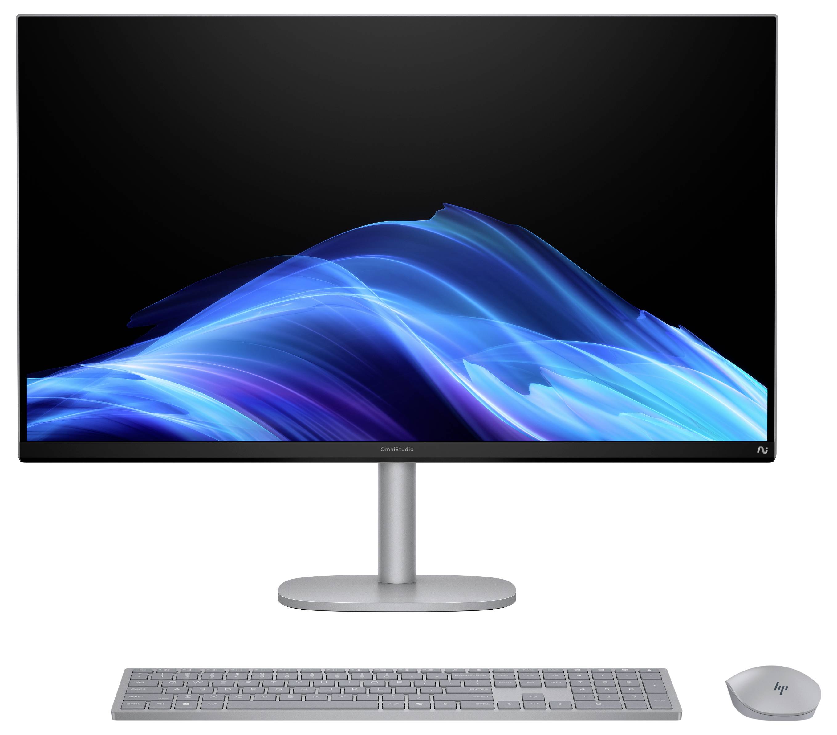 Ein schlankes, modernes Computer-Setup mit einem Breitbildmonitor, der blaue abstrakte Wellengrafiken zeigt, mit einer silbernen Tastatur und Maus.