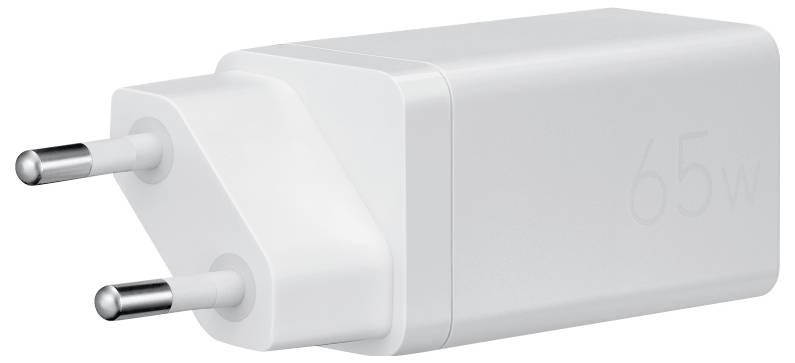 Ein weißer 65-W-Netzteil mit zwei runden Stiften, der zum Aufladen elektronischer Geräte verwendet wird.