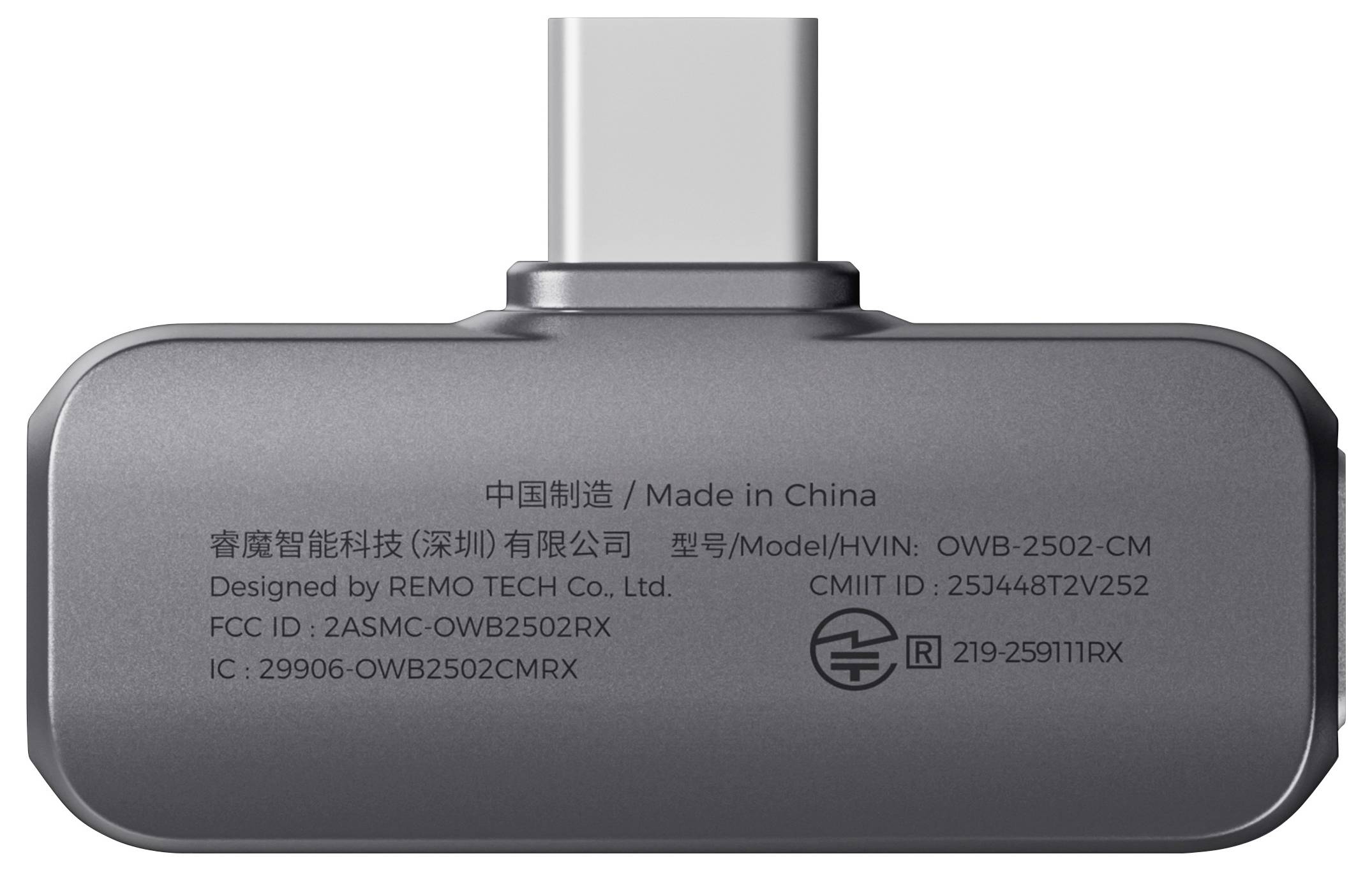 Eine Nahaufnahme eines Geräts, die dessen Ladeanschluss zeigt, mit Text, der 