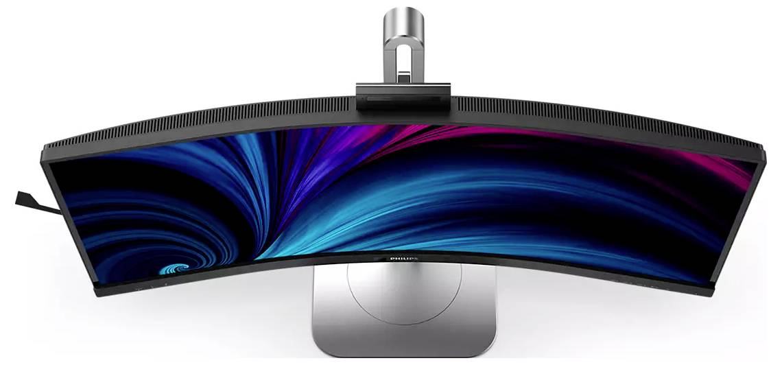 Gekrümmter Monitor von oben betrachtet, der ein dynamisches Blau- und Rosa-Wirbelmuster auf dem Bildschirm zeigt.