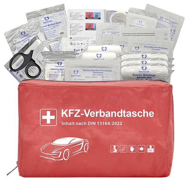 Rote Erste-Hilfe-Tasche mit verschiedenen medizinischen Utensilien einschließlich Verbandmaterial, Pflastern und einer Schere, beschriftet mit 'KFZ-Verbandtasche'.