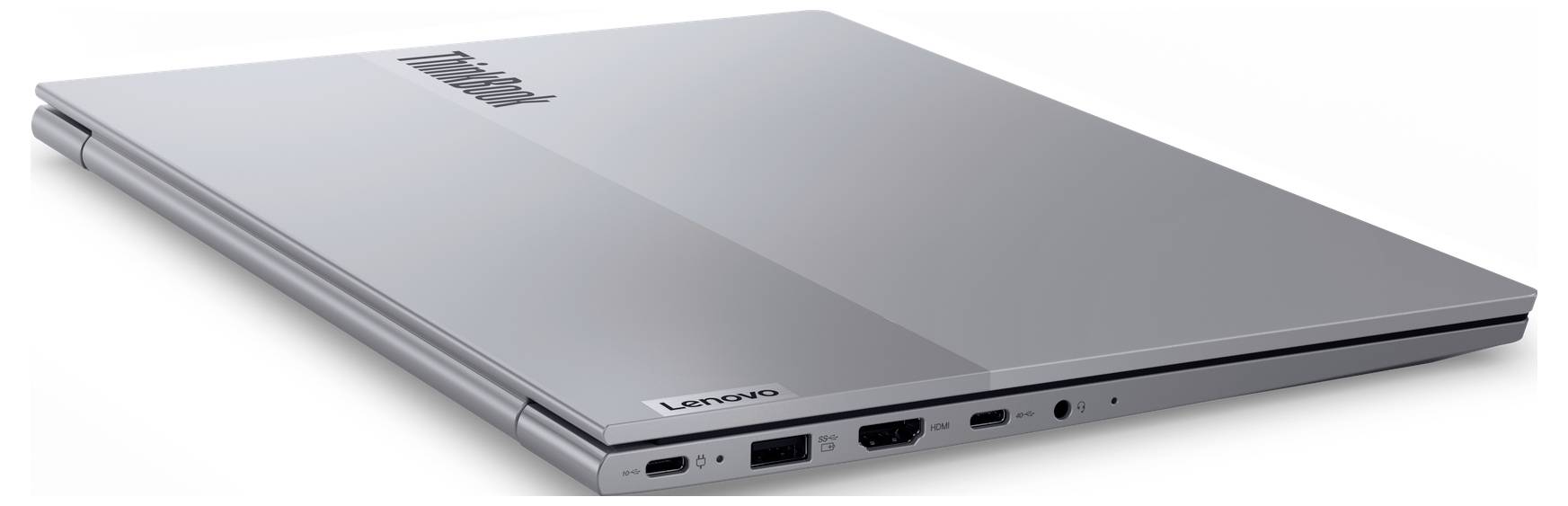 Geschlossener silberner Laptop, der auf einer ebenen Oberfläche liegt und zeigt 'ThinkPad' und 'Lenovo' Logos auf dem Deckel, mit sichtbaren Anschlüssen an der Seite.