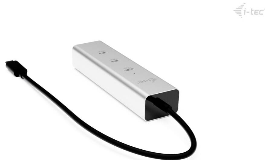 Silberner rechteckiger USB-Hub mit drei Anschlüssen und einem schwarzen Kabel, in der Ecke mit der Marke 'i-tec' versehen.