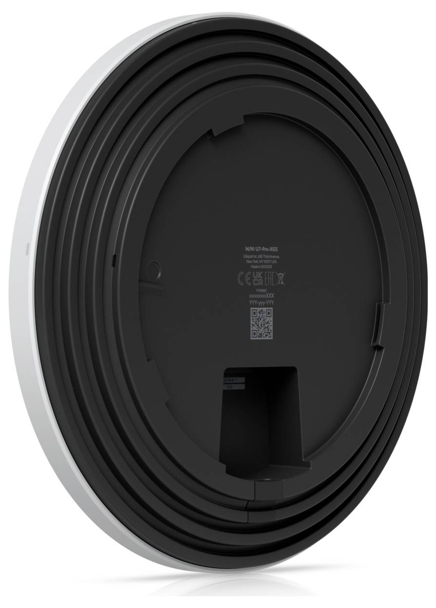 Ein runder, schwarzer Nest Protect Rauch- und Kohlenmonoxidmelder, von hinten betrachtet, mit sichtbarem QR-Code und technischen Details.