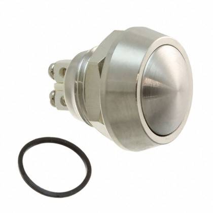 Ein metallischer Druckknopfschalter mit kreisförmigem Design, neben einem Gummidichtungsring, typischerweise verwendet für elektronische oder industrielle Anwendungen.