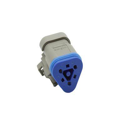 Ein blau-grauer dreieckiger Elektroanschluss mit mehreren Pinlöchern und seitlicher Verriegelung, der für die Verbindung in elektronischen Systemen verwendet wird.