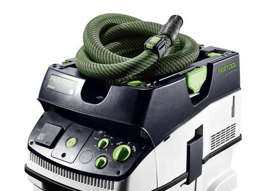 Ein Festool CLEANTEC CTM 36 E Staubsauger mit einem grünen Schlauch, der oben aufgewickelt ist, und Bedienknöpfen an der Vorderseite.