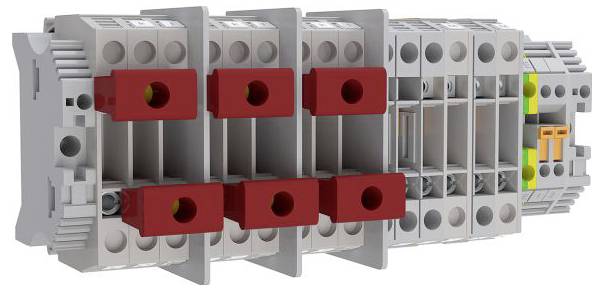 Ein dreiphasiges Sammelschienensystem-Block mit sechs roten Kupfer-Leiterpads und grauem Isoliergehäuse, konzipiert für elektrische Installationen.