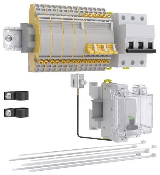 Elektrische Anschlussgarnitur mit Klemmenblock, Kabelbefestigungen, Sicherungen und Anschlusskomponenten für die Montage auf Schienensystem.