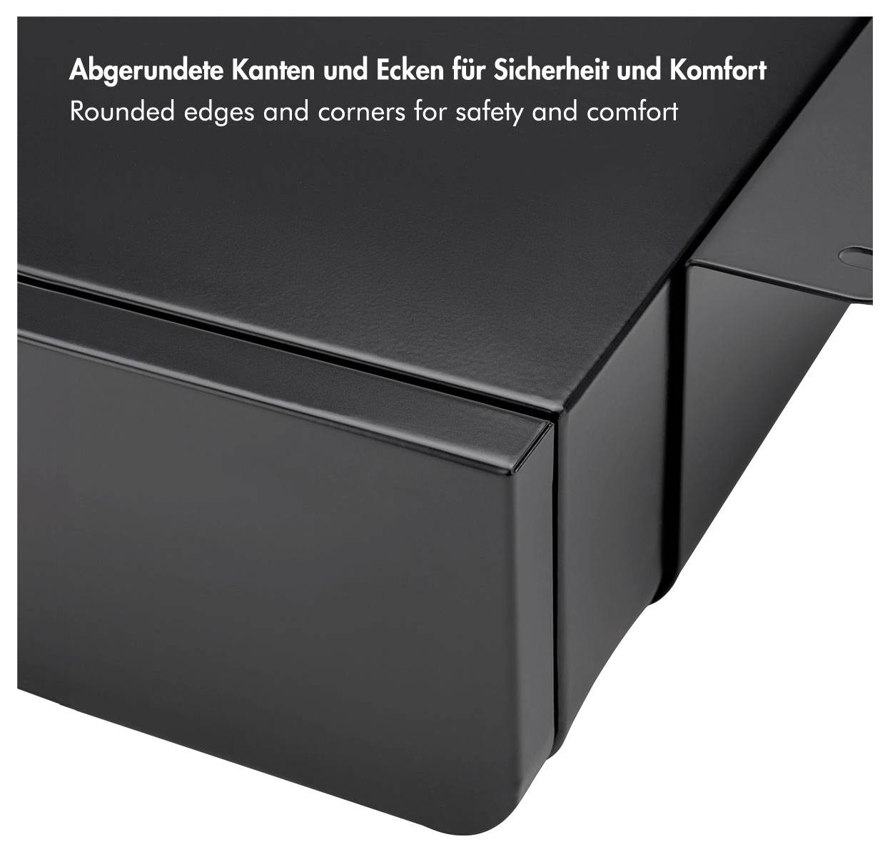 Glänzender schwarzer Gegenstand mit abgerundeten Kanten für Sicherheit und Komfort, der ein glattes Design betont.