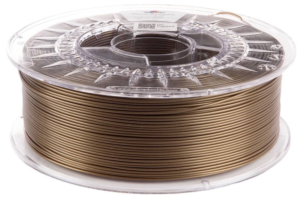 Eine Spule metallisch braunen 3D-Druckfilaments, fest aufgewickelt und in einem transparenten Kunststoffhalter eingeschlossen.