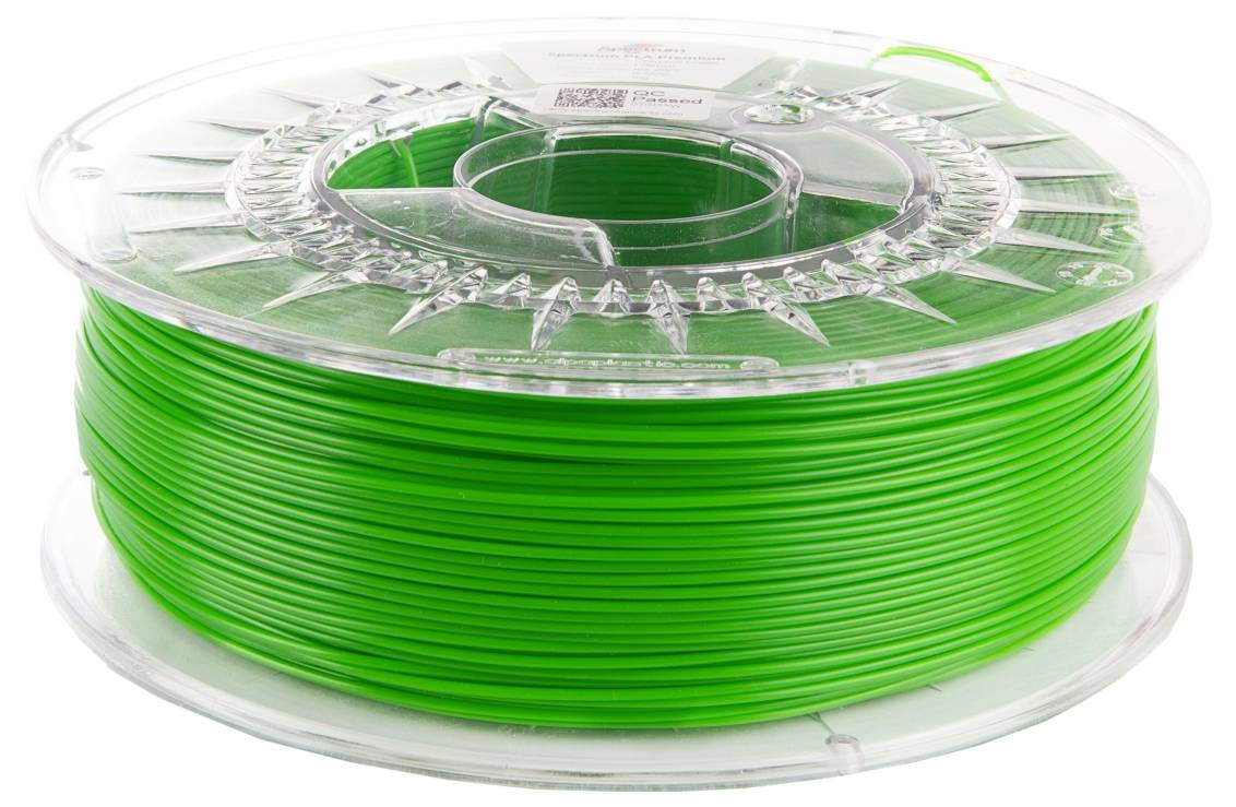 Eine Spule hellgrünes 3D-Druckerfilament, sauber aufgewickelt und in einem durchsichtigen Plastikbehälter verpackt.