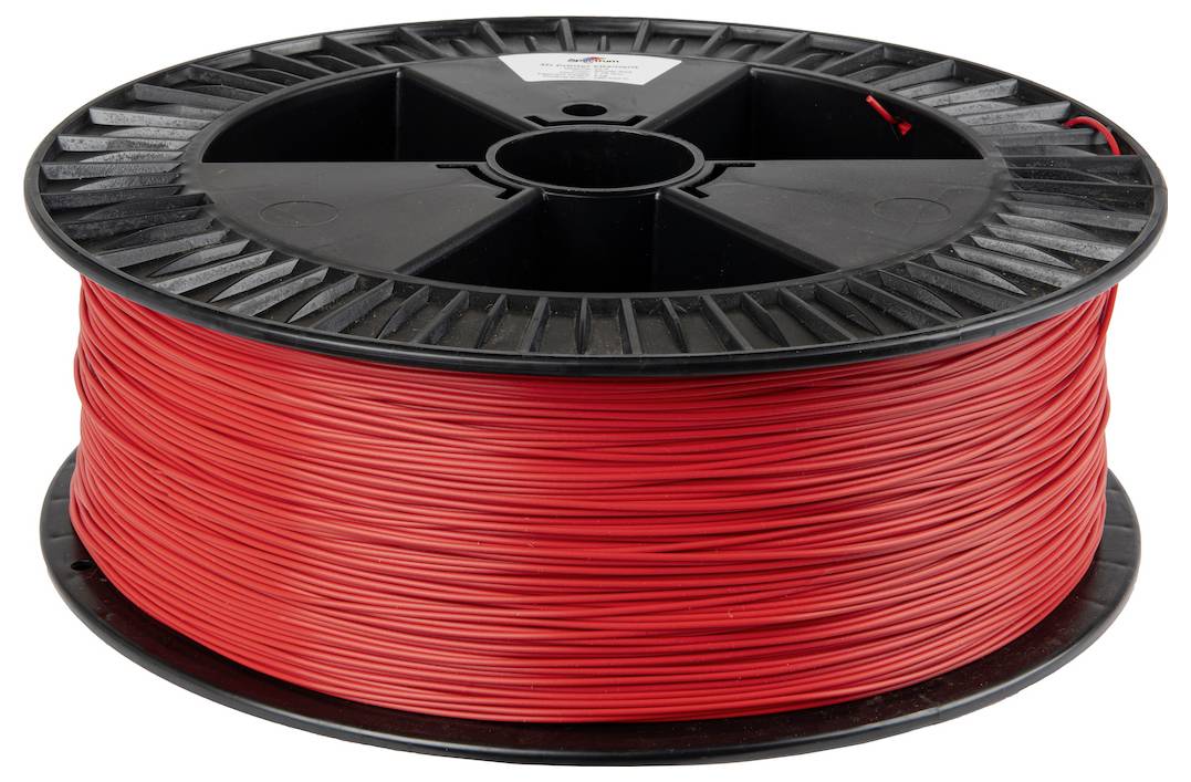 Rote Spule aus 3D-Druckerfilament, aufgewickelt auf einer schwarzen Rolle, verwendet für additiven Fertigungsprozess und Prototypenerstellung.